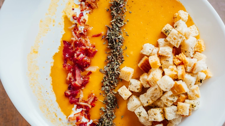 Pumpkin cream soup with seafood